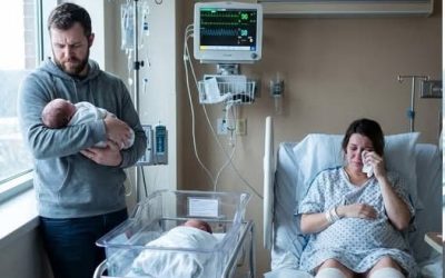 I kept the truth to myself. I was the one who bought back my husband’s parents’ home. While his wealthy mistress basked in admiration, I stayed silent. When I went into labor with twins, not a single person came to the hospital. They were all celebrating her “generosity” at that same house. The very next day, my husband handed me divorce papers. “You’re useless,” he said flatly. “And I’m taking one of the babies.” He thought I was defenseless. He assumed I had nothing. By morning, police cars were parked outside the Donovan residence. I never interrupted Patrick when he proudly told people, “Savannah saved the house.” In our small Massachusetts town, those words carried weight. Savannah Pierce, designer dresses, charity galas, polished smile, stood soaking in applause as neighbors praised her for preventing foreclosure. But that wasn’t the reality. No cameras flashed when I signed the paperwork. No one clapped when I wired the money. I used my maiden name, set up an LLC, transferred the funds quietly, and closed the deal in a dull gray office that smelled like toner and paper. I did it because Harold and Susan Donovan had spent four decades in that house. Because Patrick once told me the porch swing held his childhood. Because I was pregnant with his twins and still believed love could be rebuilt through sacrifice. When my contractions started, Patrick wasn’t there. He texted instead. Busy. Savannah’s hosting. Mom needs help. Another contraction hit as I stared at the message. No call from my mother-in-law. No check-in from his siblings. They were all gathered in that house, my house, laughing and praising Savannah. In the delivery room, the fluorescent lights hummed while a nurse guided my breathing. “Is anyone on their way?” she asked softly. I forced a thin smile. “Apparently not.” By sunrise, my twins arrived. My son cried strong and loud. My daughter watched the world quietly. I held them and swallowed the ache in my chest. Patrick appeared the next afternoon, smelling of cologne and rosemary chicken. He didn’t ask about the birth. He didn’t touch me. He placed a large envelope on the hospital tray. Divorce papers. “You couldn’t save my parents’ house,” he said. “Savannah did. She actually accomplishes things.” His eyes shifted to the bassinets. “I’m taking one.” My body went cold. “You can’t,” I whispered. “I can,” he replied calmly. “What do you have? You don’t even have a home.” Then the hospital door opened. Two uniformed officers entered, followed by a detective holding a thick file. “Addison Grant?” he asked. “We need to discuss the Donovan property.” Patrick’s color vanished. And beyond the doorway, footsteps approached quickly. SAY “YES” IF YOU WANT TO READ THE FULL STORY !!